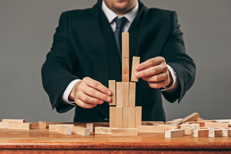 Our Story 3 man wooden cubes table management concept 155003 13891
